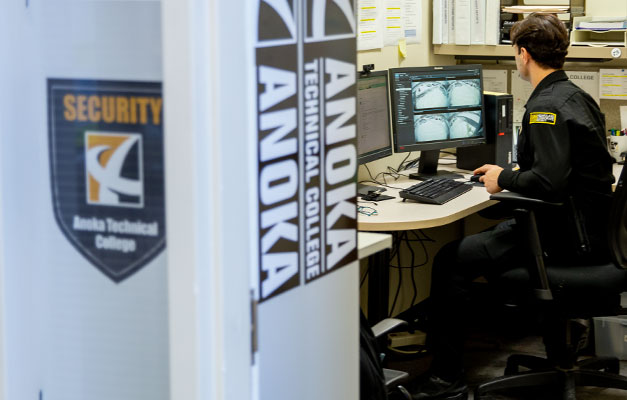 Safety Officer Working in Security Office. 